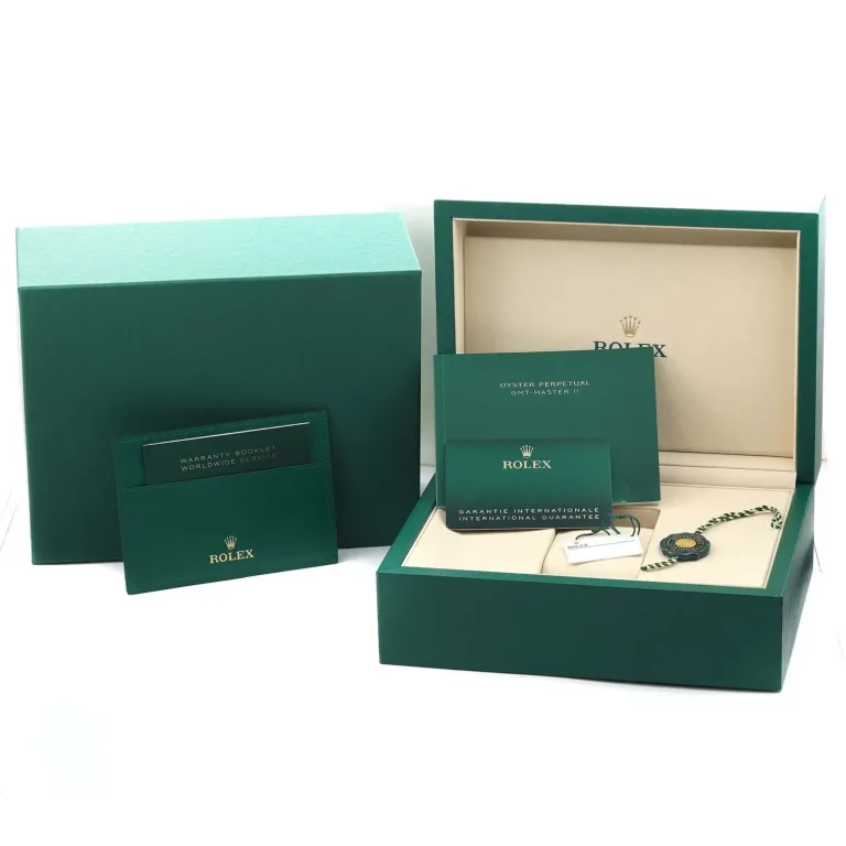 Rolex box, tag, and card.